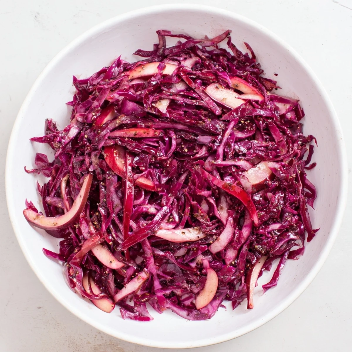 Tender red cabbage and sliced apples simmered into delicious Sweet & Sour Bavarian Red Cabbage perfection.