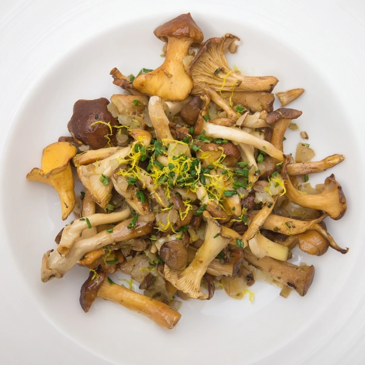 Flavorful Enchanted Forest Mushrooms simmering in white wine, offering an earthy and aromatic bite.
