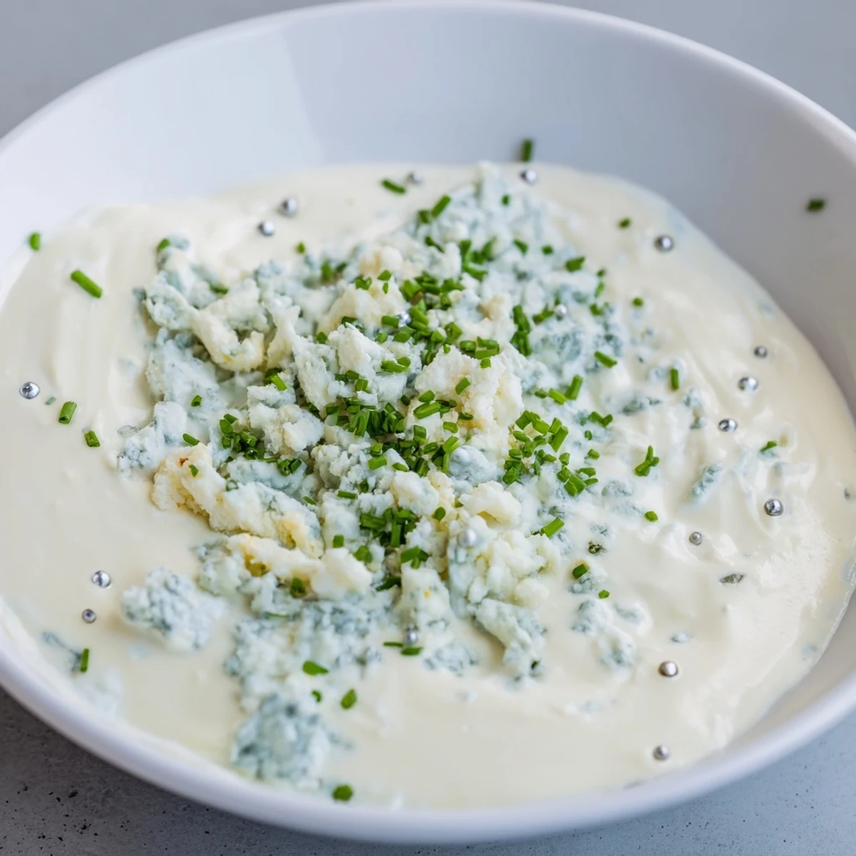 Creamy Frozen Pond Blue Dip Platter, a beautiful blue appetizer with colorful chips and veggies.