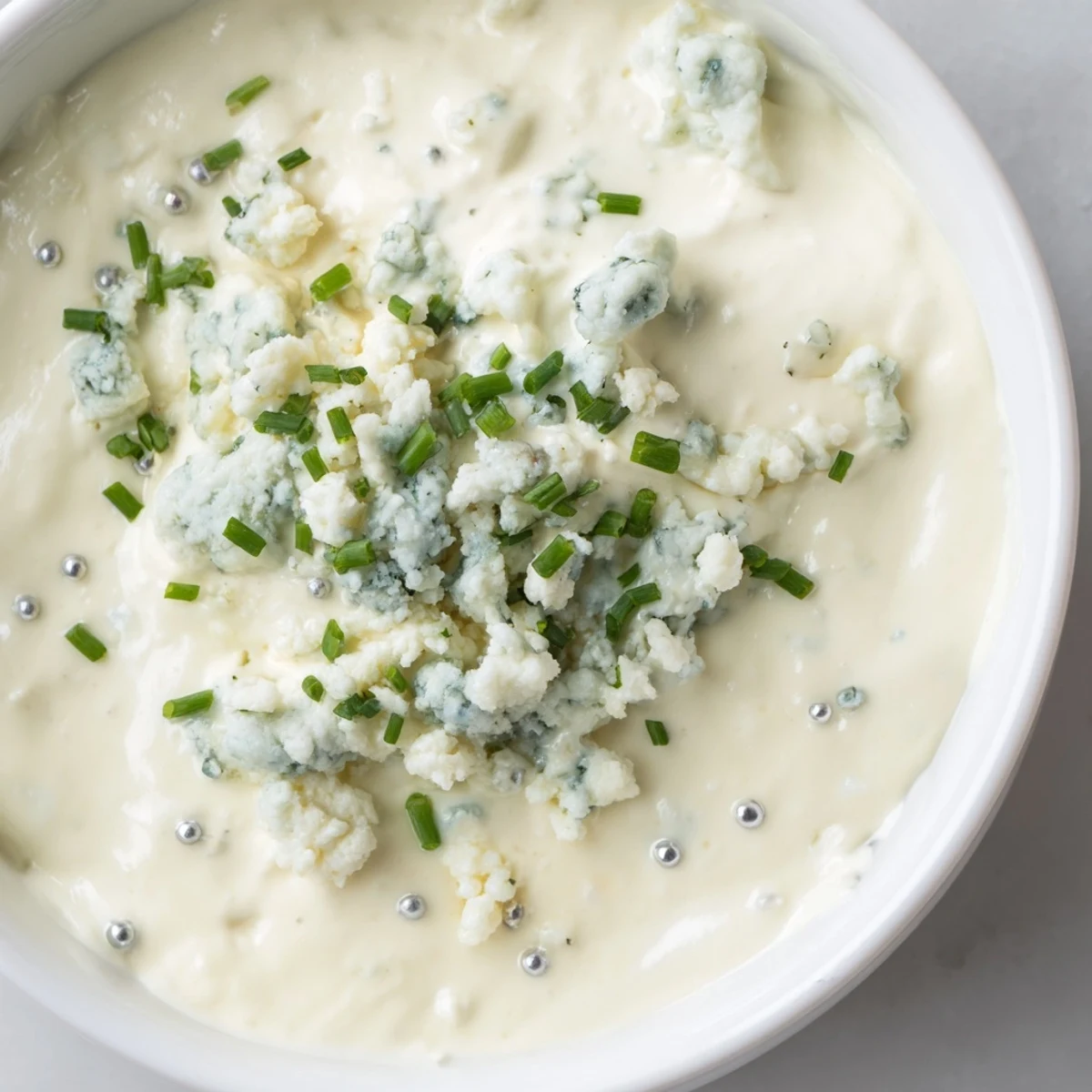 Party-ready Frozen Pond Blue Dip Platter, perfect for dipping, featuring vibrant vegetables and crisp chips.