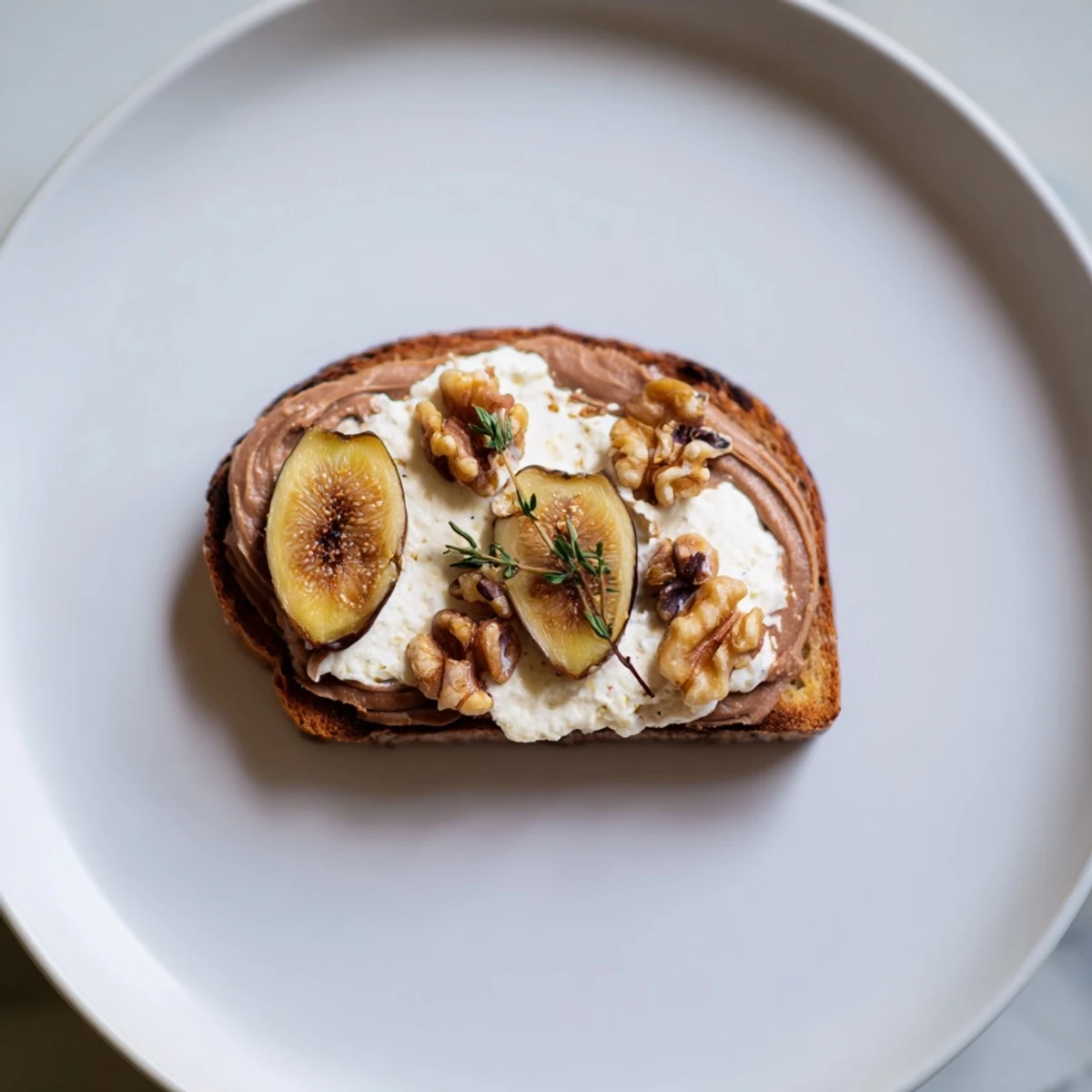 Creamy pâté and sweet figs in a beautiful arrangement create the alluring Royal Tapestry appetizer.