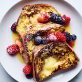 Warm, custardy Ice Cream French Toast with lightly crisp edges, perfect for brunch.