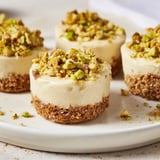 These mini Pistachio Cheesecake Bites showcase a glistening, smooth pistachio filling ready to enjoy, bite by bite.
