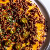 A close-up shot of a homemade Spicy Ground Beef Pizza Base, showcasing savory ground beef toppings.