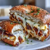 High-protein bagels layered with fluffy baked eggs and melted cheddar, perfect for a hearty breakfast meal prep.