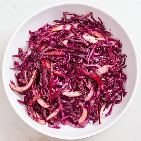Tender red cabbage and sliced apples simmered into delicious Sweet & Sour Bavarian Red Cabbage perfection.