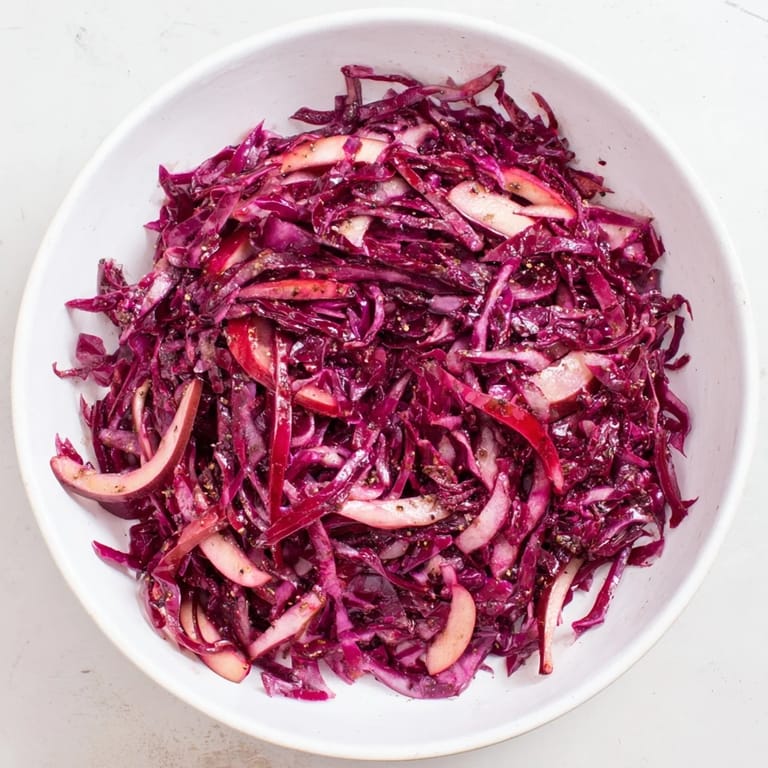 Tender red cabbage and sliced apples simmered into delicious Sweet & Sour Bavarian Red Cabbage perfection.