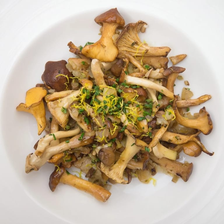 Flavorful Enchanted Forest Mushrooms simmering in white wine, offering an earthy and aromatic bite.