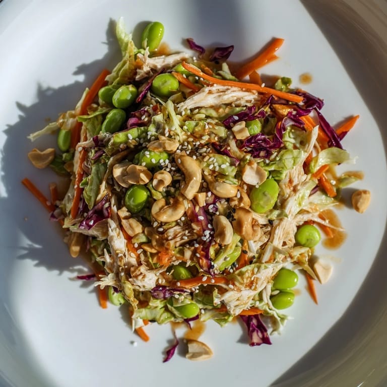 Fresh, crunchy Edamame Crunch Chicken Salad with bright vegetables, edamame, and a zesty ginger dressing, ready to serve.