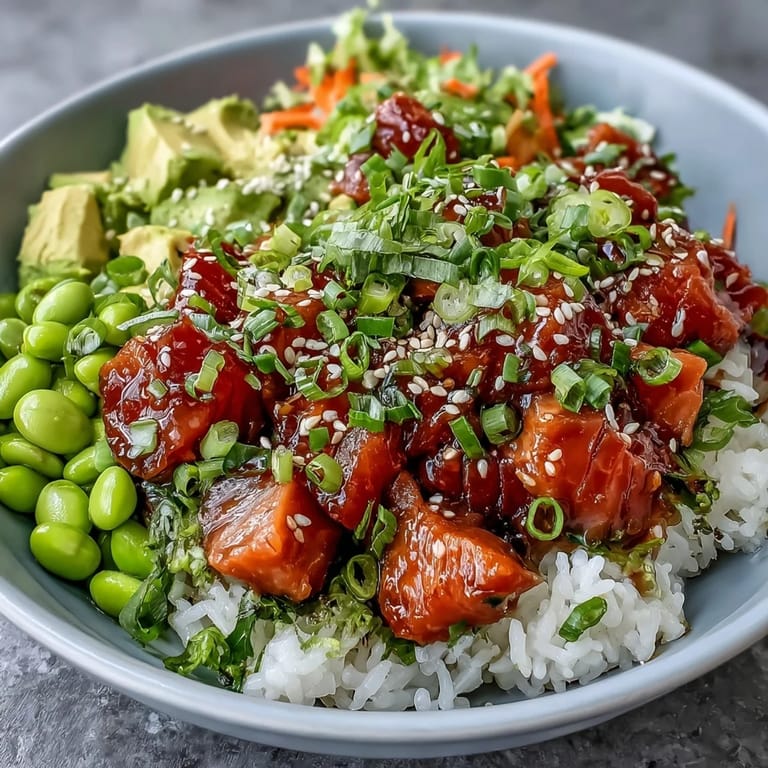 Deliciously prepared Salmon Poke Bowl, showcasing fresh ingredients and bright colors.